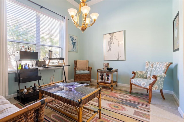 living area featuring an inviting chandelier