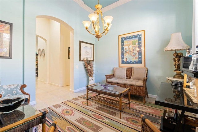 living area featuring light tile patterned flooring, ornamental molding, and a notable chandelier