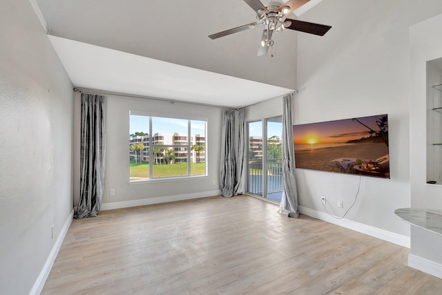 spare room featuring light wood-type flooring and ceiling fan