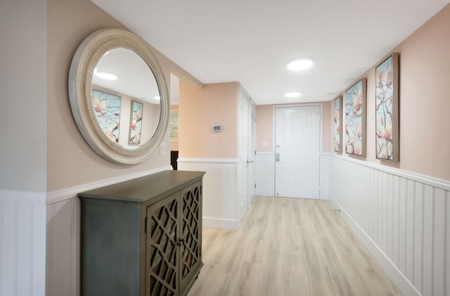 hallway with light wood-type flooring