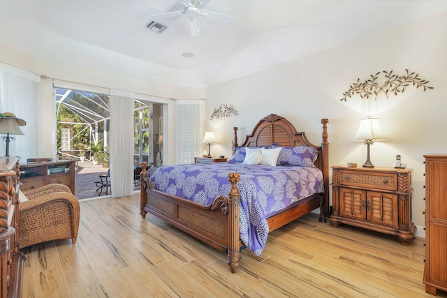 bedroom featuring ceiling fan, light wood-type flooring, and access to outside