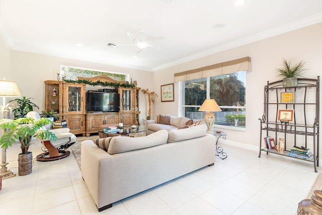 living room with ceiling fan, crown molding, and light tile patterned flooring