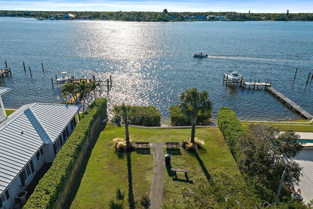 bird's eye view with a water view