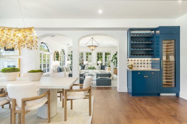 dining area with hardwood / wood-style floors