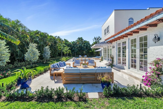 view of patio with french doors and an outdoor hangout area