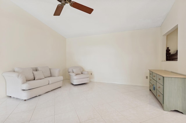 living room featuring ceiling fan and lofted ceiling