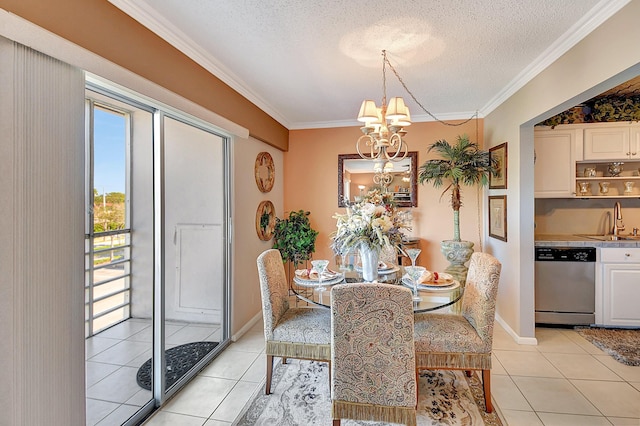 dining space with ornamental molding, light tile patterned floors, a textured ceiling, and an inviting chandelier