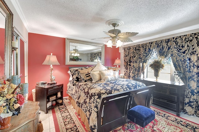 tiled bedroom featuring ceiling fan, a closet, a textured ceiling, and ornamental molding