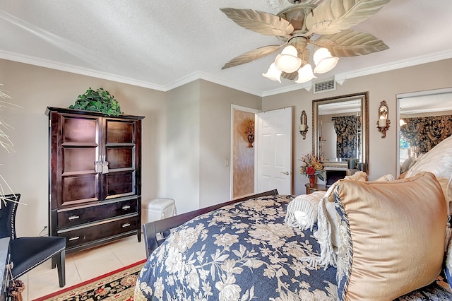 bedroom featuring light tile patterned floors, a textured ceiling, ceiling fan, and crown molding