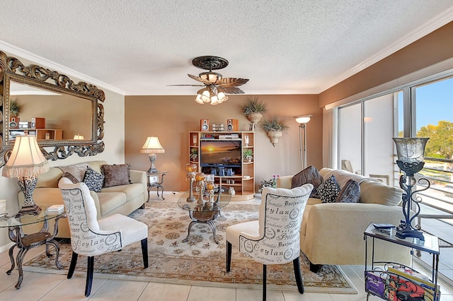 living room featuring crown molding, light tile patterned floors, a textured ceiling, and ceiling fan