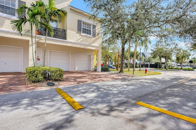 view of front of property featuring a garage