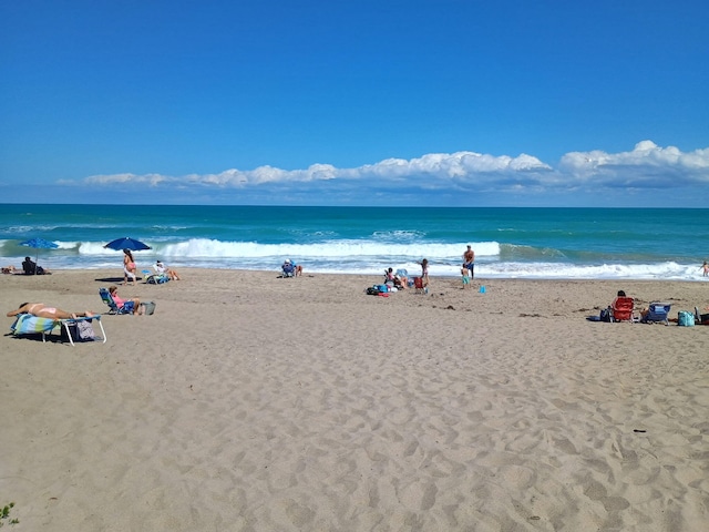 property view of water featuring a view of the beach