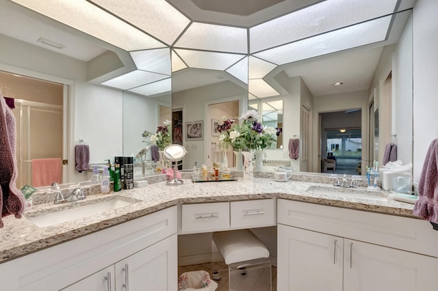 bathroom featuring tile patterned floors and vanity