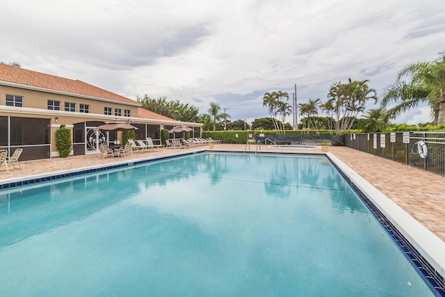 view of pool featuring a patio