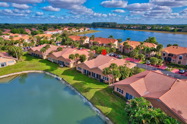 drone / aerial view with a water view