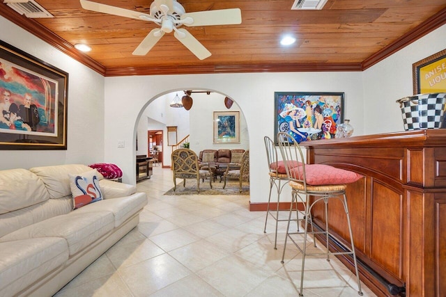 living room with ceiling fan, wooden ceiling, and ornamental molding