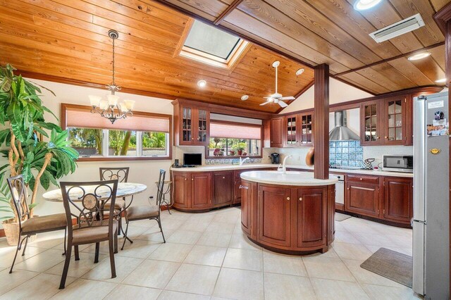 dining room with wooden ceiling, light tile patterned floors, a chandelier, and lofted ceiling