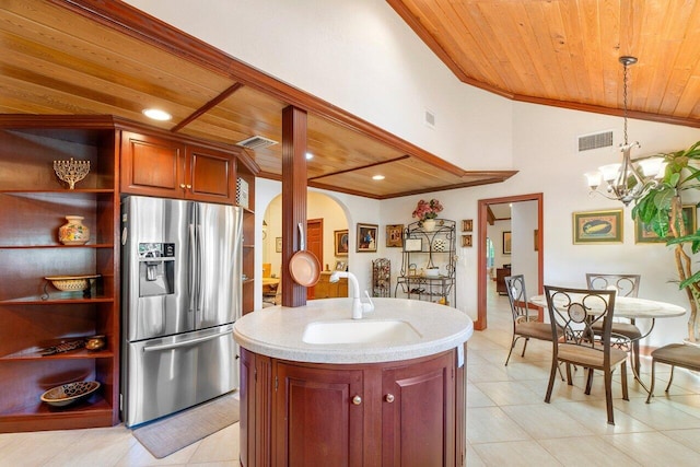 kitchen with stainless steel refrigerator with ice dispenser, decorative light fixtures, an inviting chandelier, and wood ceiling