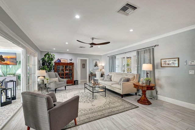 living room featuring ceiling fan and ornamental molding