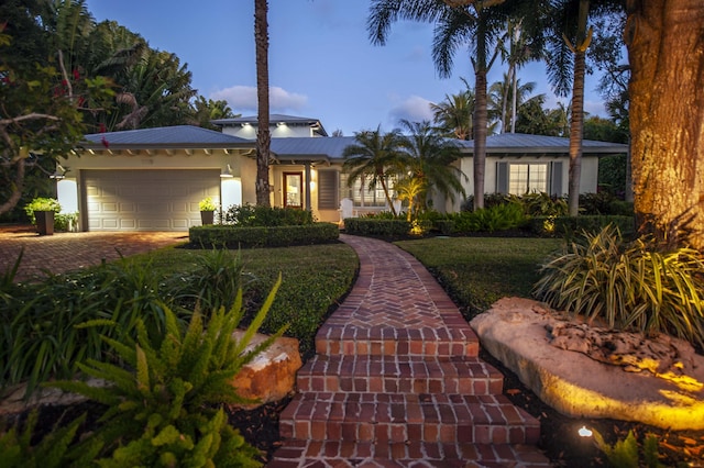 view of front of home with a garage