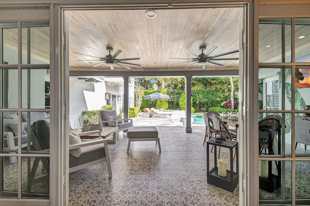 sunroom with wood ceiling