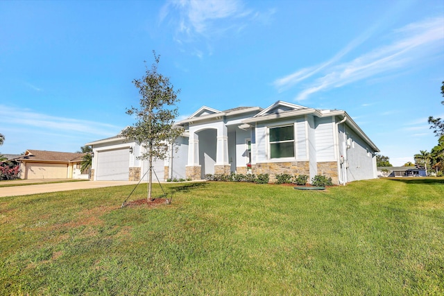 view of front of property with an attached garage, stone siding, driveway, and a front lawn