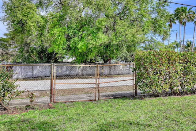 view of yard featuring a gate and fence