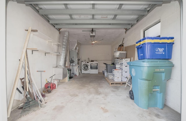 garage with washing machine and dryer