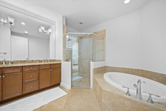 bathroom featuring tile patterned flooring, vanity, and separate shower and tub