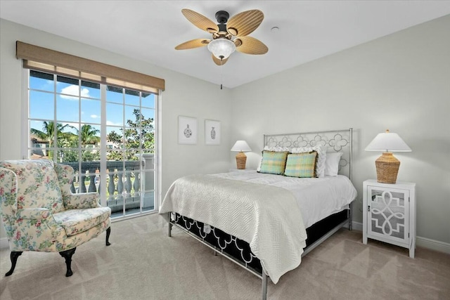 bedroom featuring access to outside, ceiling fan, and light colored carpet