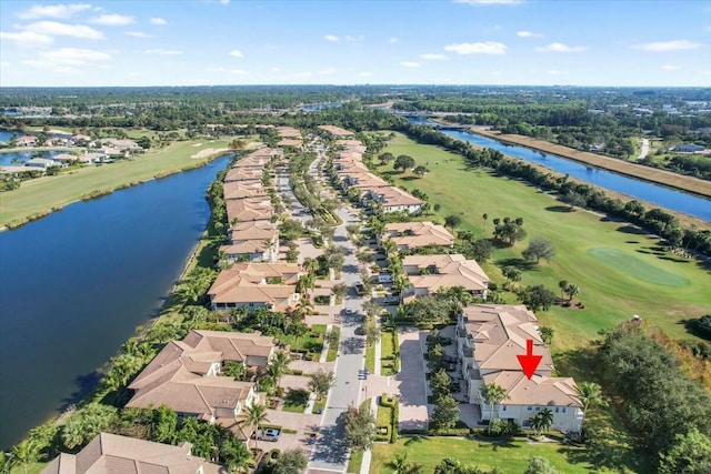 drone / aerial view featuring a water view