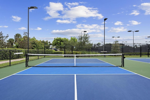 view of tennis court with basketball court