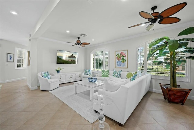 living room with light tile patterned floors, ceiling fan, and ornamental molding