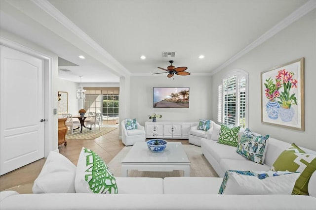 living room featuring ceiling fan, crown molding, and light hardwood / wood-style floors