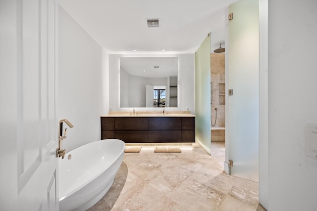 bathroom featuring vanity and plus walk in shower