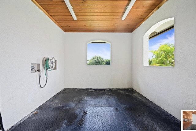 interior space featuring wooden ceiling