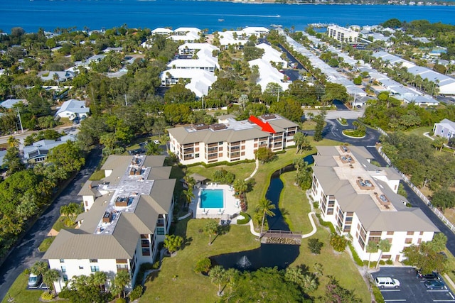 bird's eye view with a water view