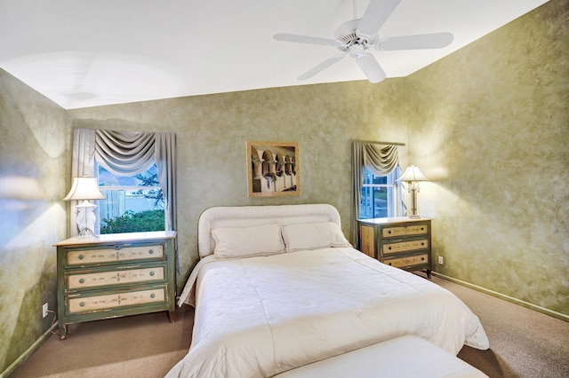 bedroom with ceiling fan and carpet