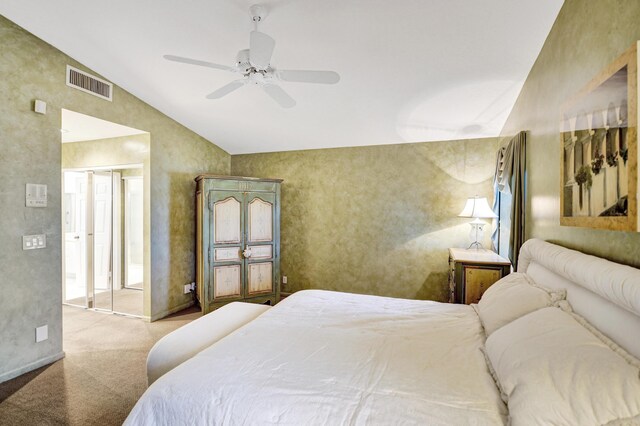 bedroom featuring ceiling fan, light carpet, and lofted ceiling