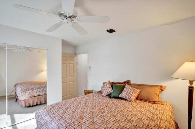 bedroom featuring ceiling fan and carpet flooring