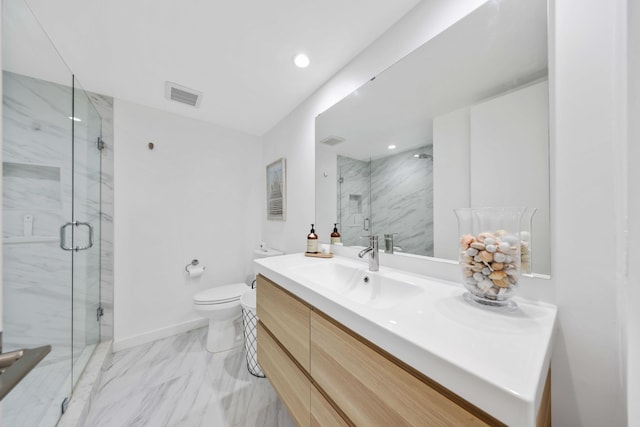 bathroom with vanity, toilet, and walk in shower