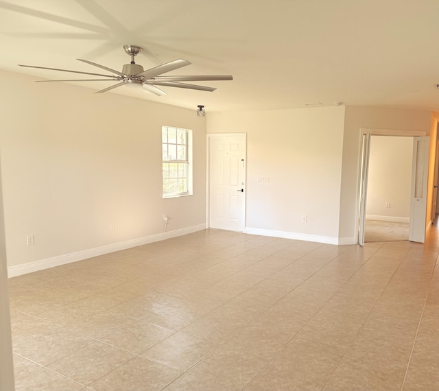 unfurnished room with ceiling fan