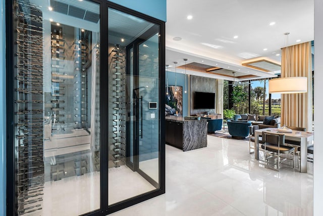 wine area with floor to ceiling windows