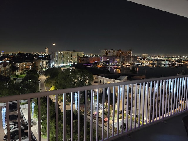 view of balcony at twilight