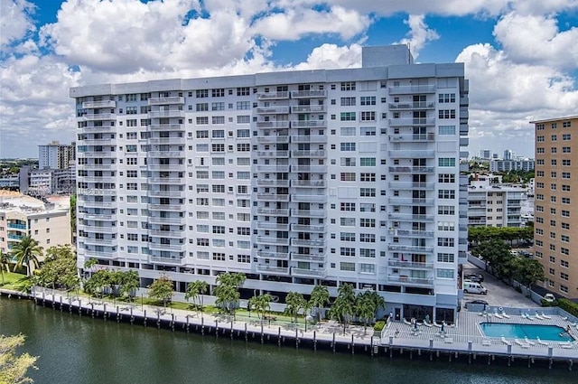 view of property featuring a view of city and a water view