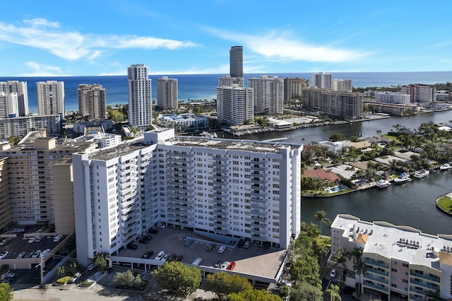 aerial view featuring a city view and a water view