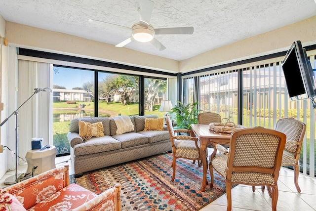 sunroom / solarium with ceiling fan