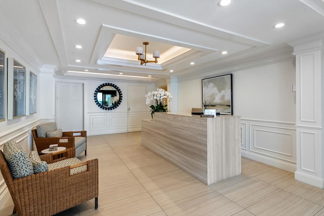 reception area featuring a chandelier