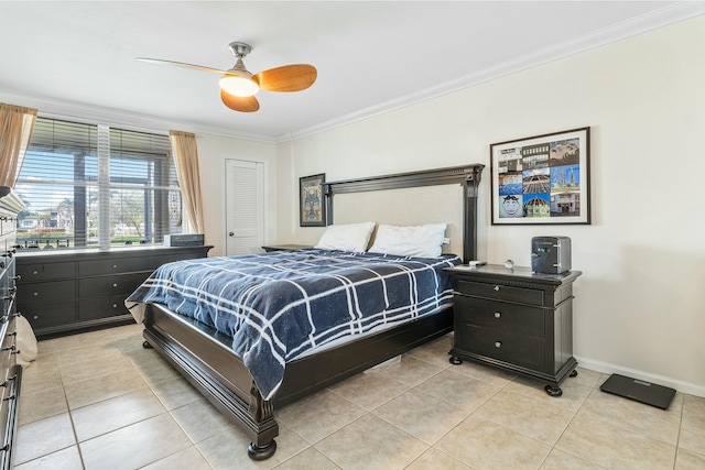 bedroom featuring a closet, ceiling fan, ornamental molding, and light tile patterned flooring