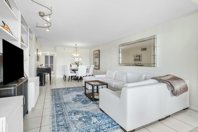 living room with light tile patterned flooring